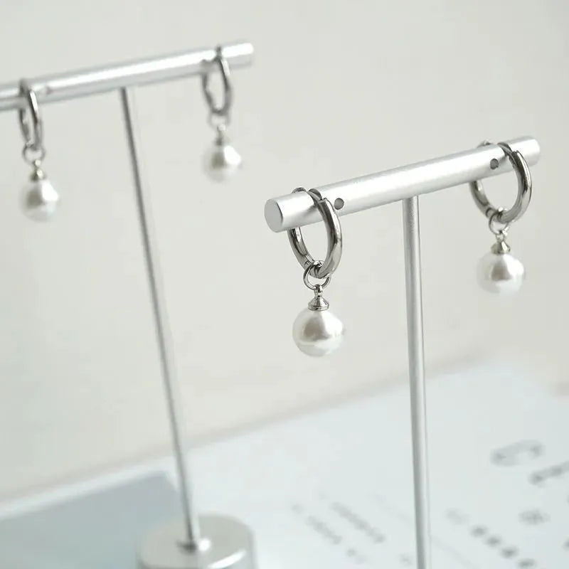 Alloy geometric pearl drop earrings with titanium steel posts, approximately 20-24mm length