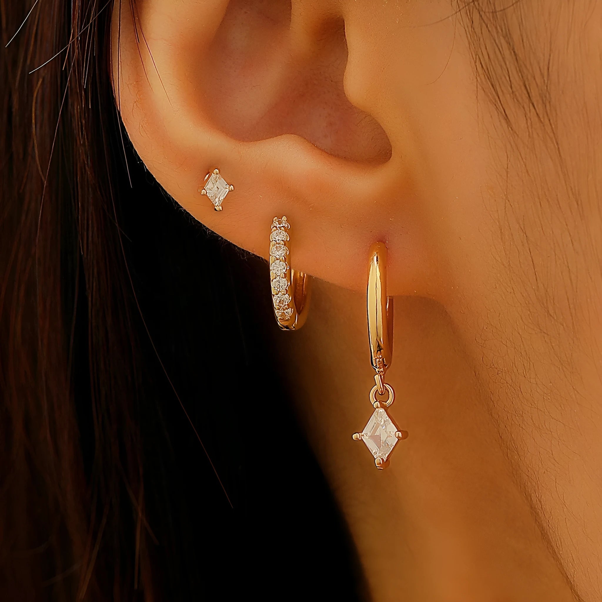 Ladies three-piece ear jewellery set with geometric diamond shapes and inlaid zircon stones in gold and white colours