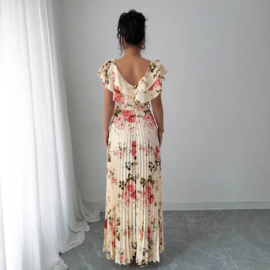 Apricot floral print dress with V-neck, ruffled sleeves, and a swing skirt.