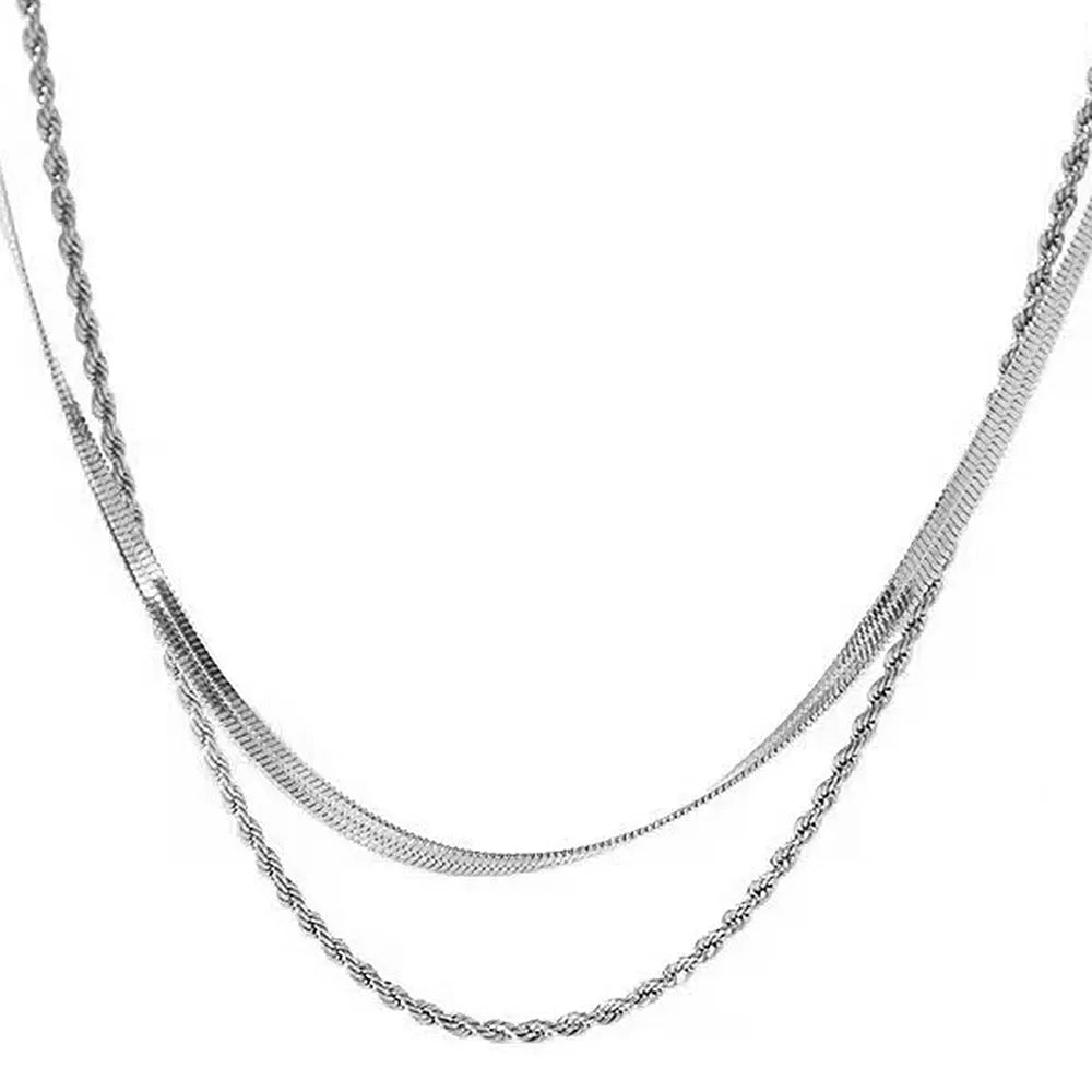 Geometric titanium steel pendant on adjustable snake bone chain necklace showing double-layer twist design
