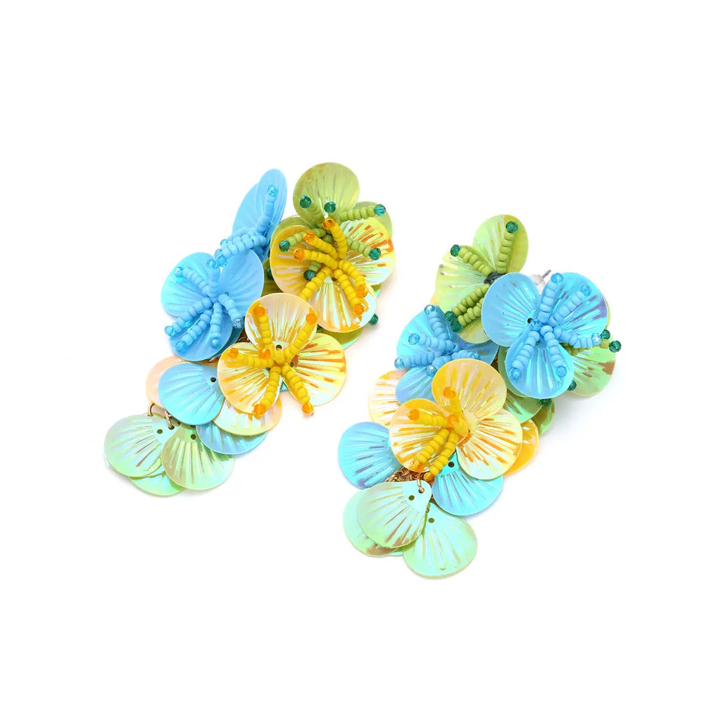 Handmade string bead flower earrings with exaggerated dopamine design in mixed materials showing floral and leaf shapes