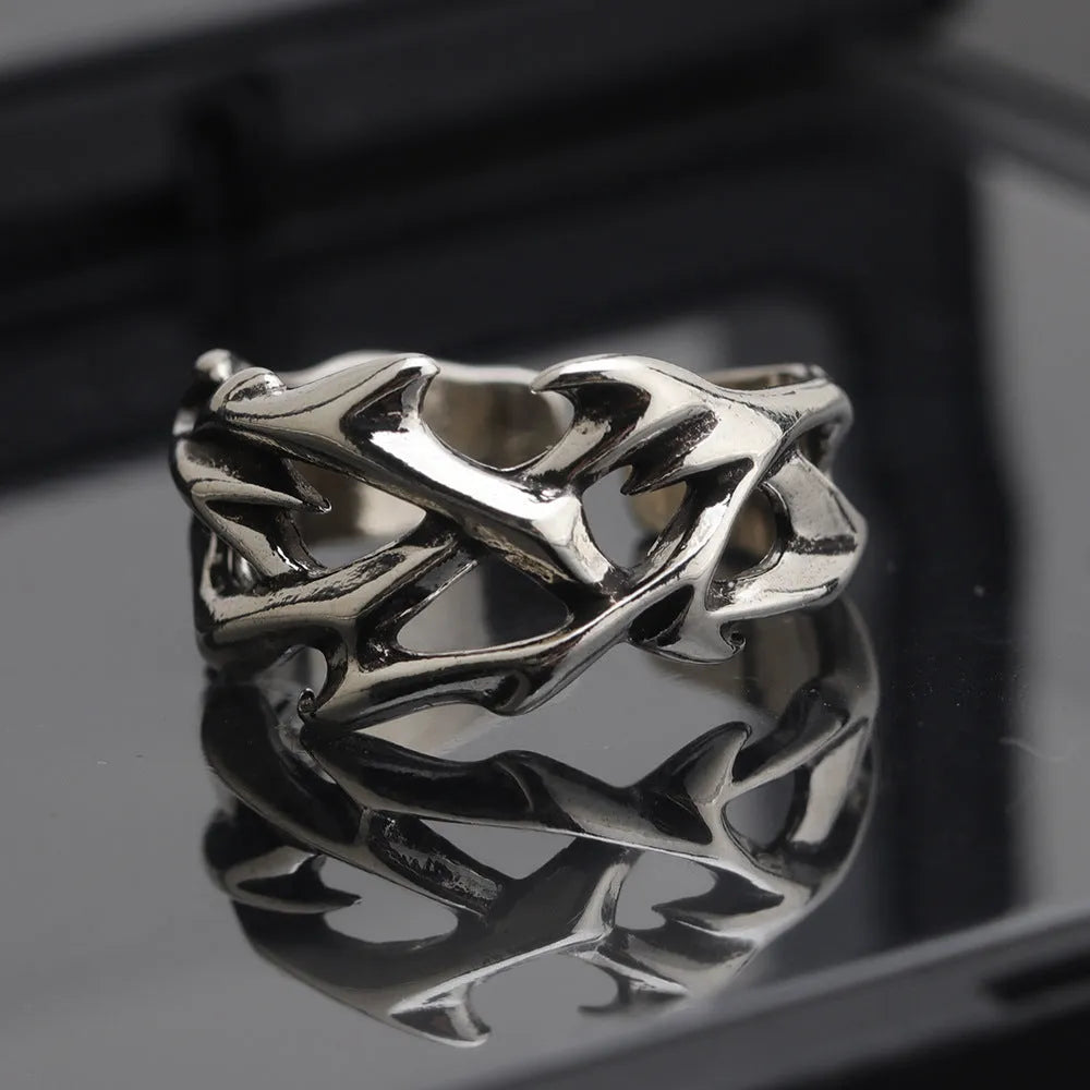 Adjustable copper thorn flower ring with geometric design and flexible opening