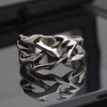 Adjustable copper thorn flower ring with geometric design and flexible opening