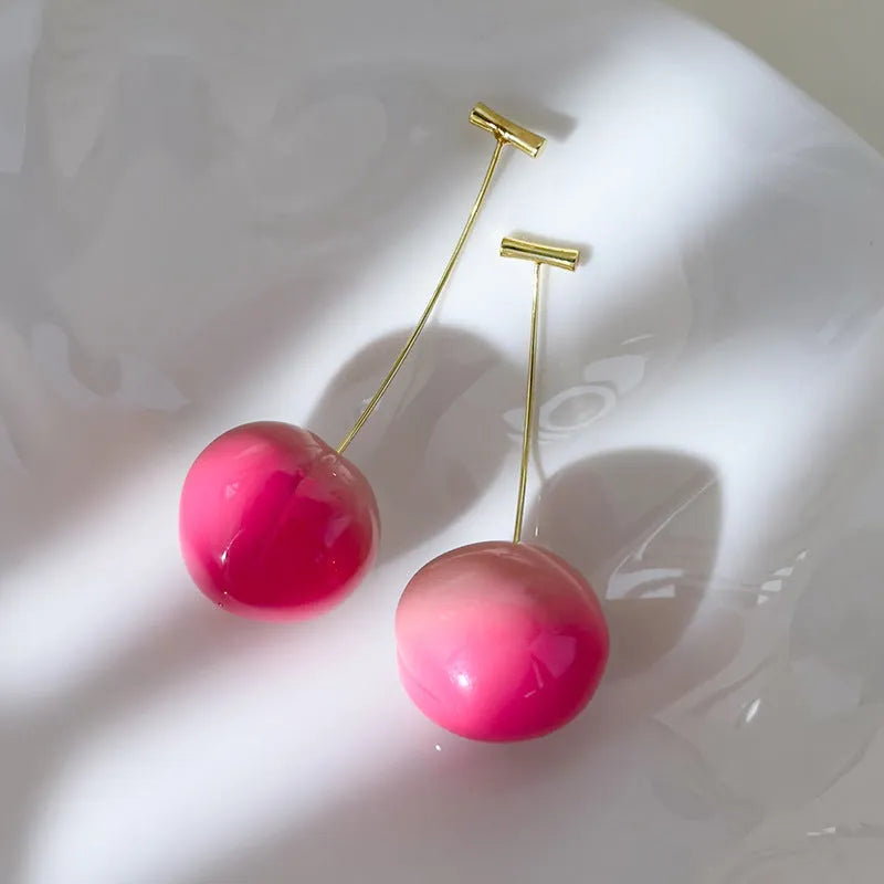 Acrylic peach fruit earrings in small and large sizes with copper posts