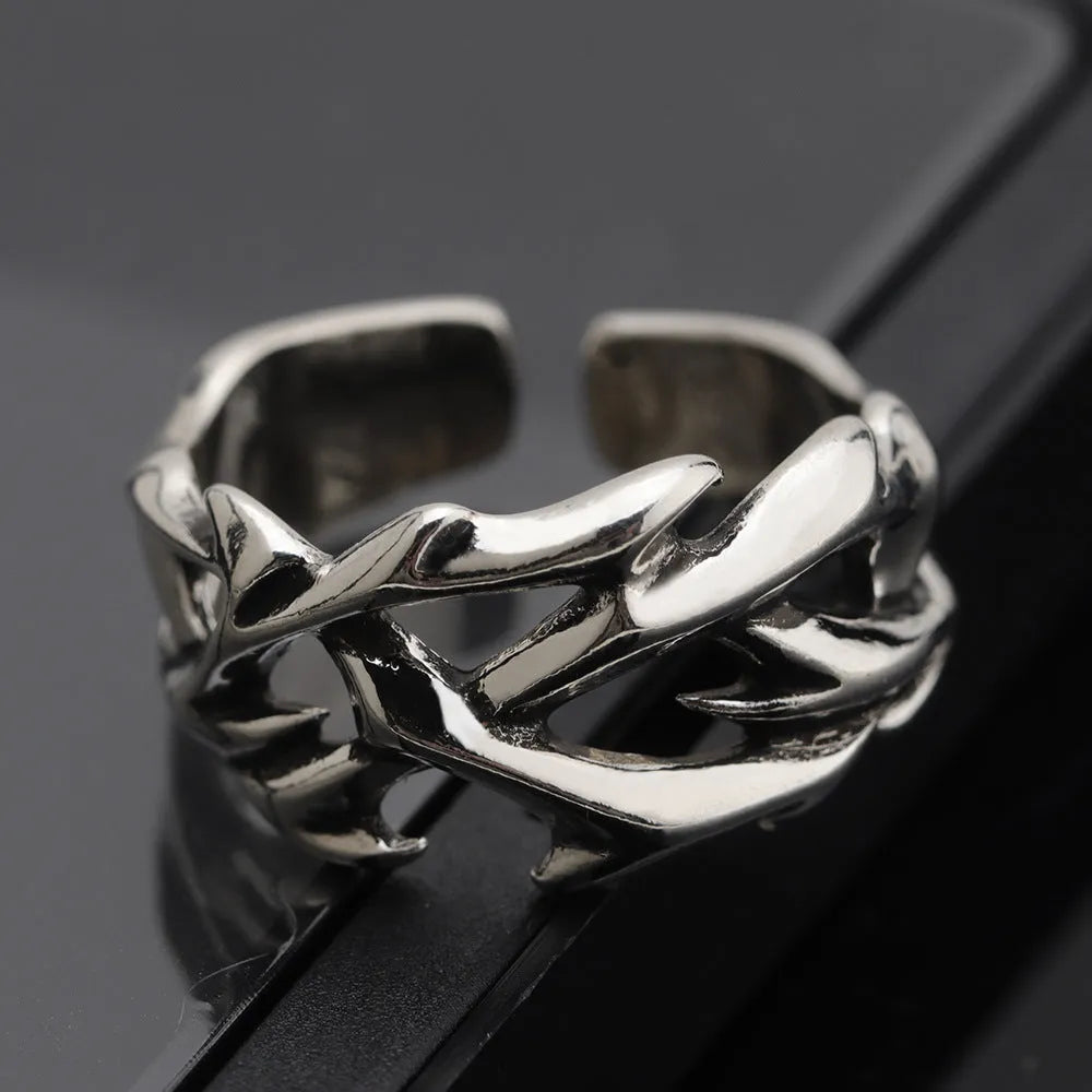 Adjustable copper thorn flower ring with geometric design and flexible opening