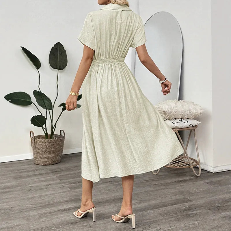 Light green women's shirt dress with lapel collar, waist tie belt, and side seam pockets.
