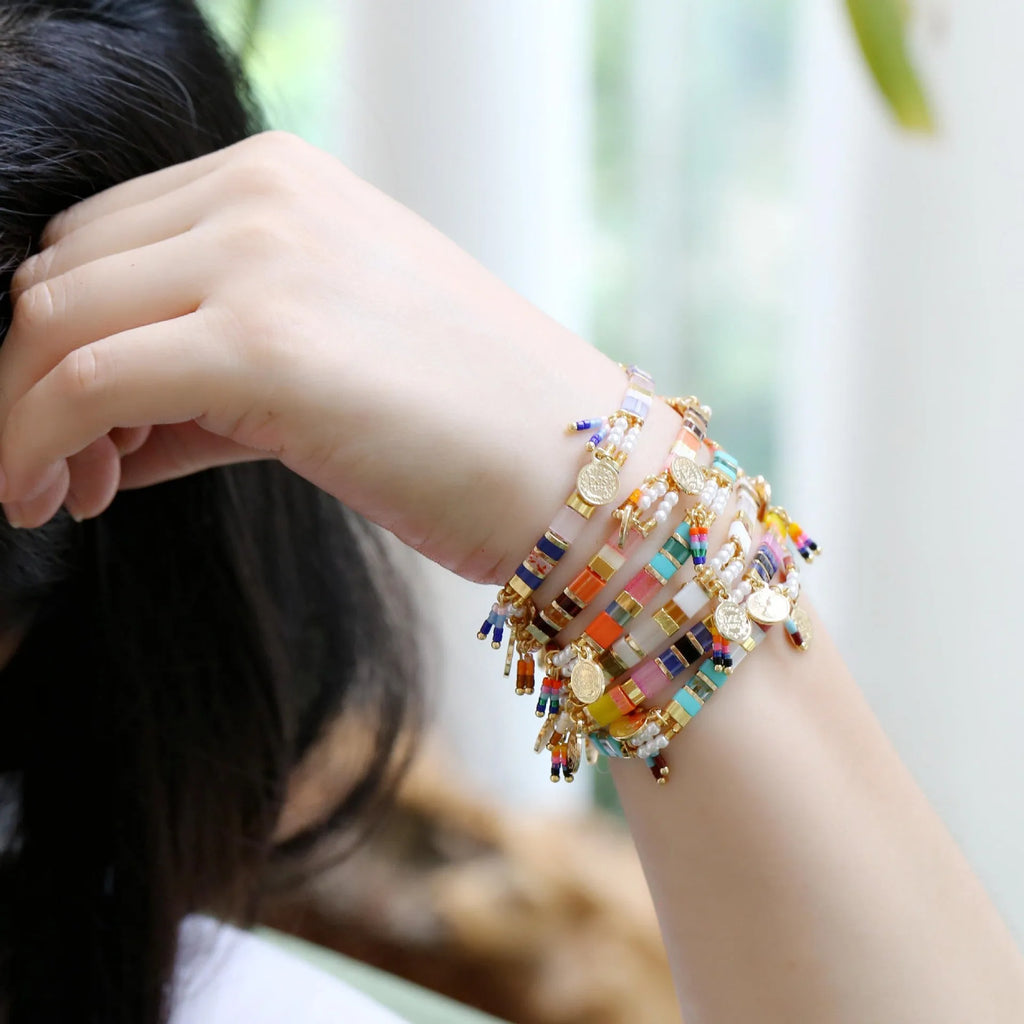 Women's handmade bracelet with imitation pearls and glass coloured beads in original design