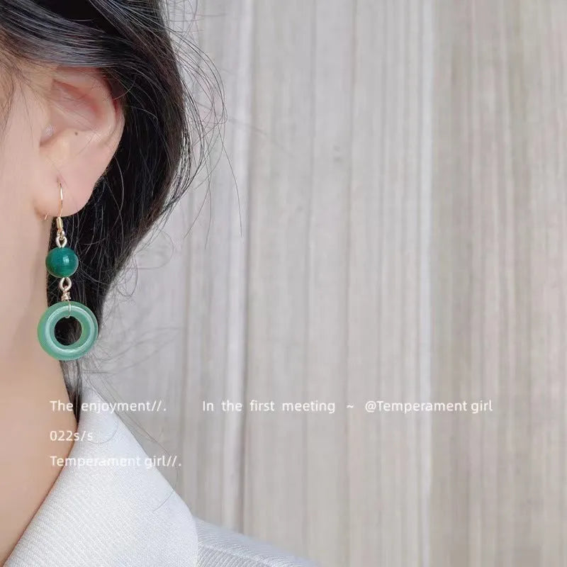 Green jade design peace buckle earrings with 14K gold plated zinc alloy finish
