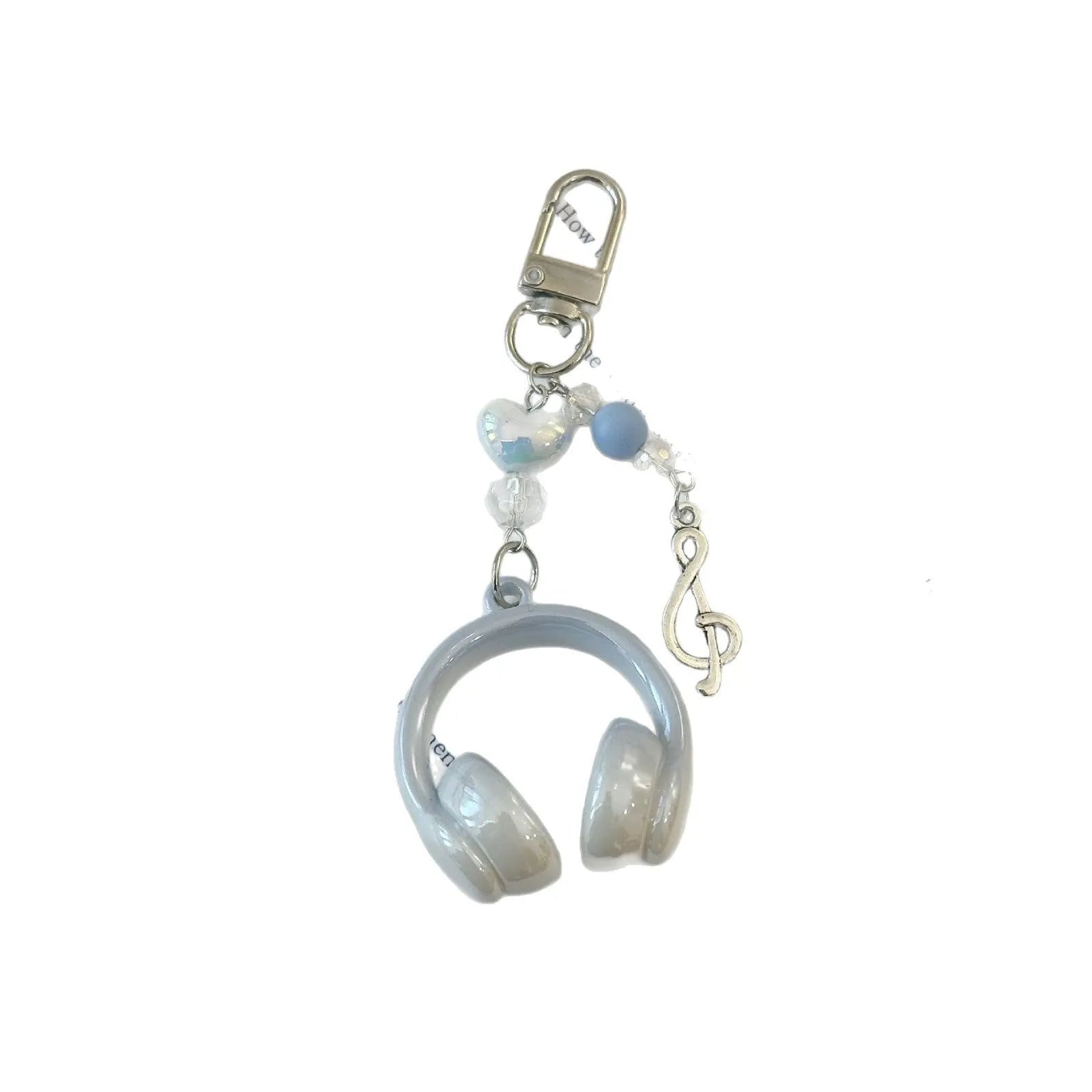 Creative music headset keychain with gradient blue resin earphone pendant and alloy keyring on a plain background