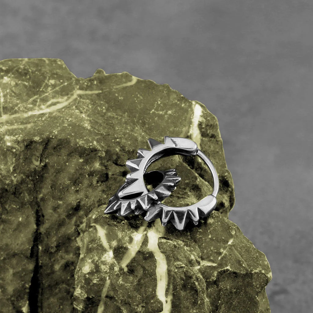 Stainless steel round ring earrings with polished finish showing circular design