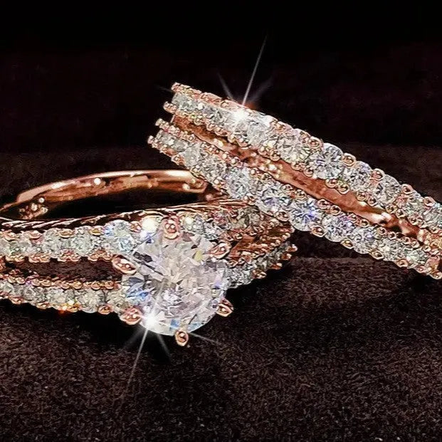Two fully jewelled women's rings in a set, shown in gold, rose gold, and silver colour options.