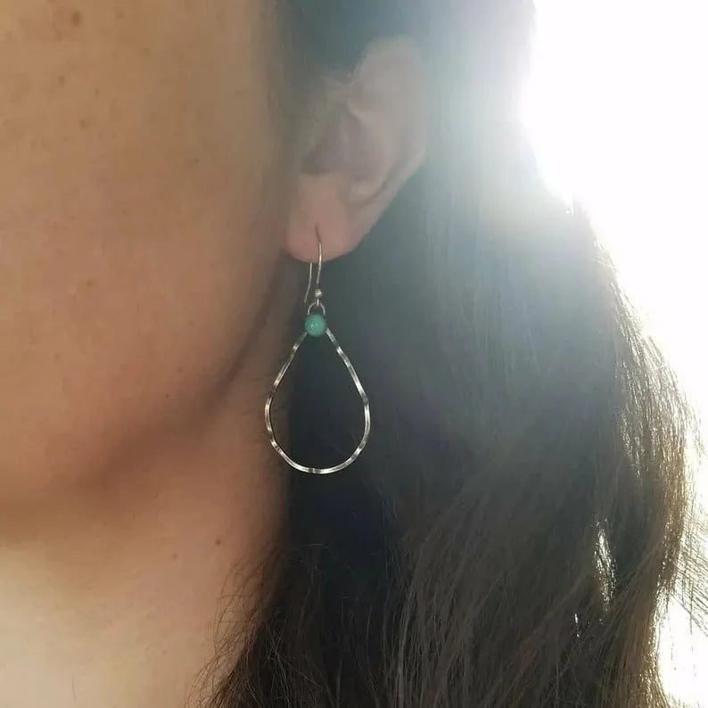 Circular bohemian style earrings with geometric design in antique silver finish