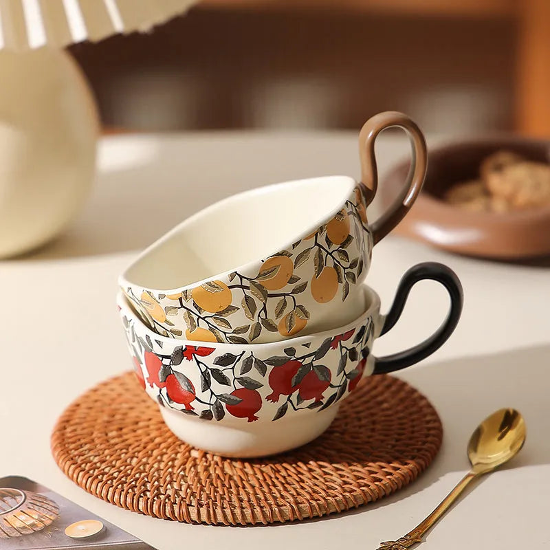 Ceramic coffee cup and saucer set in medieval pomegranate design with 210ml capacity
