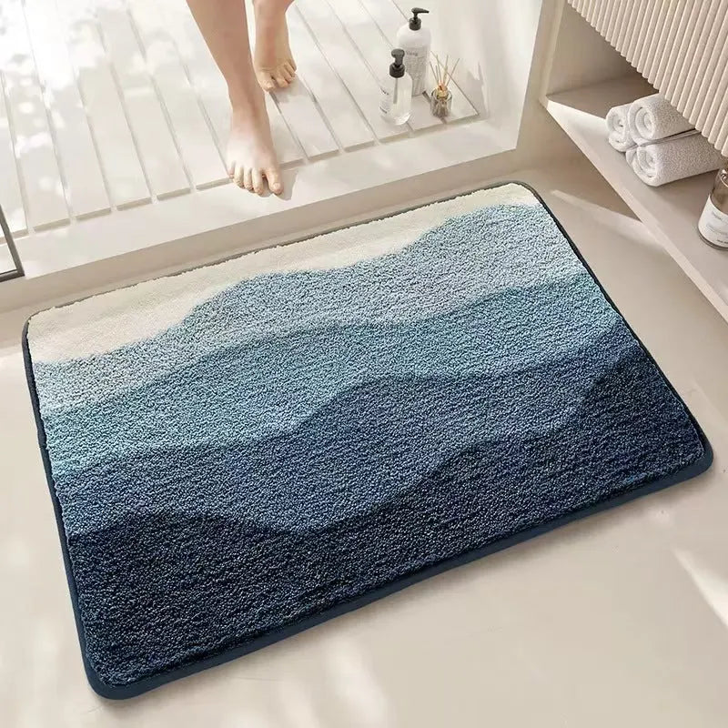 Square rainbow pattern floor mat with plastic bottom in Sky Sea colour, shown in 40x60cm size