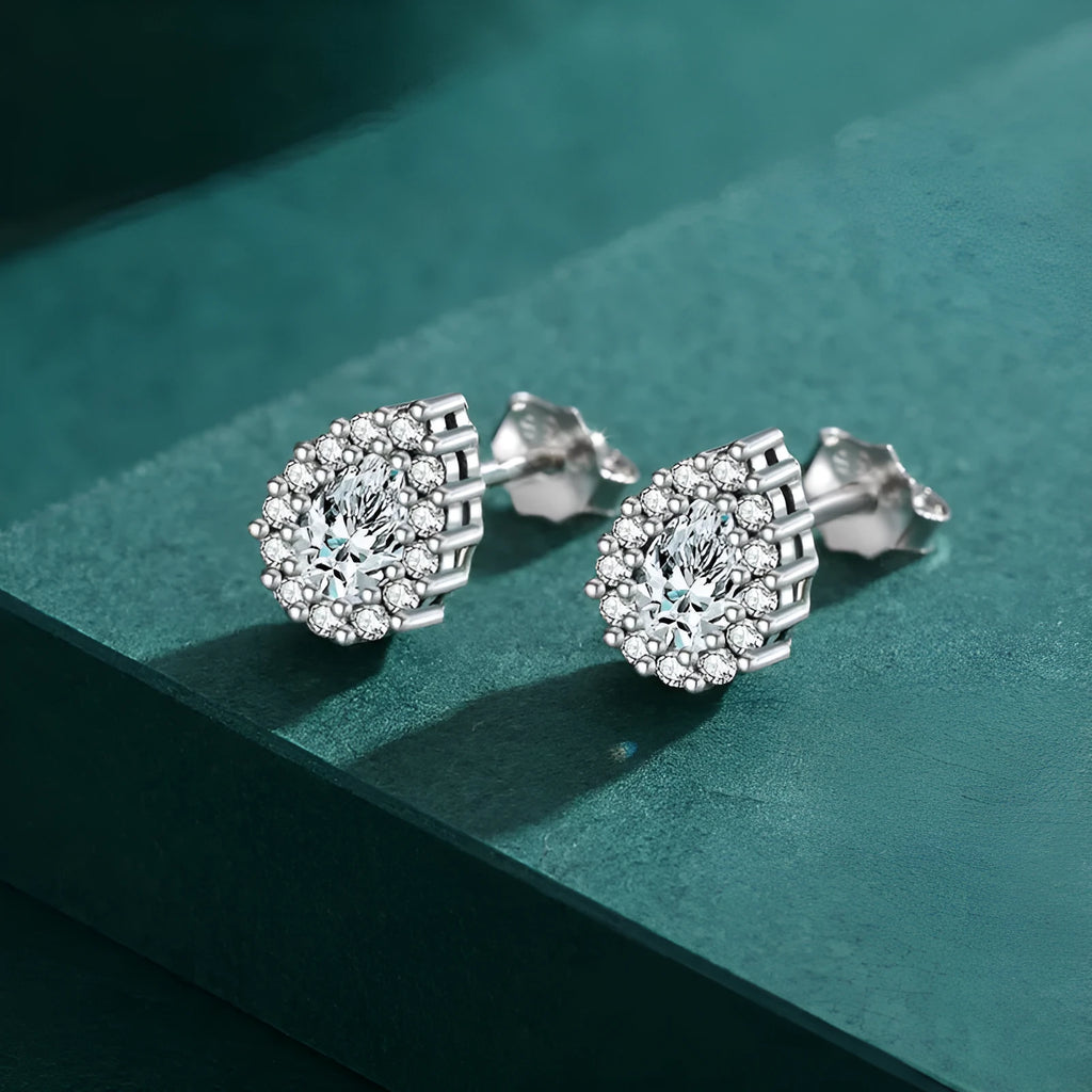 Women's silver water drop ear studs with diamond-cut surface on 925 sterling silver