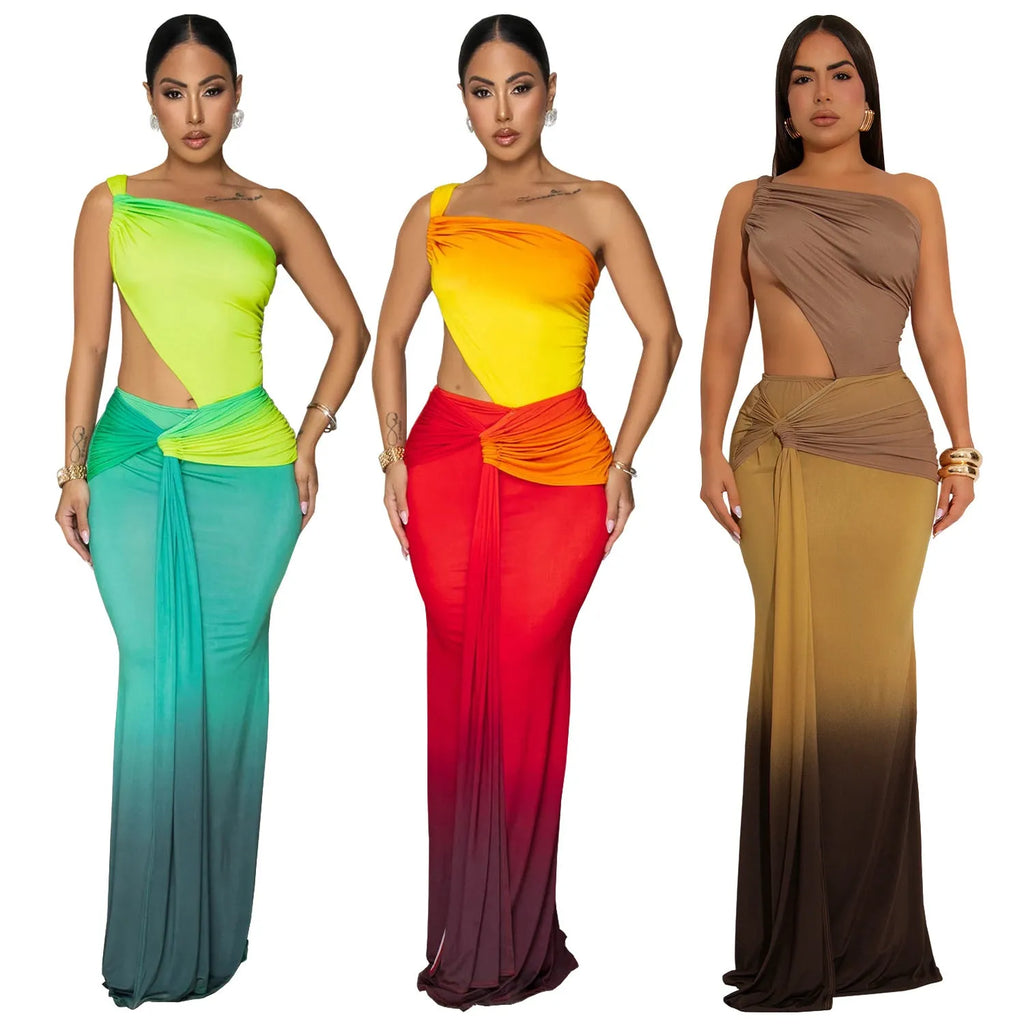 A woman's long gradient dress with a cross-shoulder neckline and high waist, shown in a colour option.