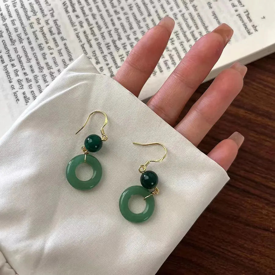 Green jade design peace buckle earrings with 14K gold plated zinc alloy finish
