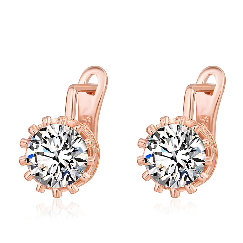 Korean retro crown shape ear clip earrings in rose gold or white gold colour on a copper base.