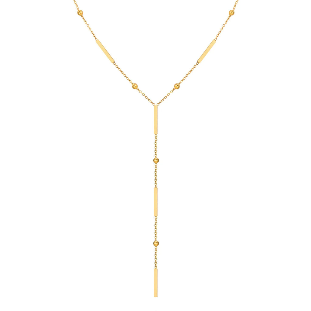 Women's stainless steel gold electroplated geometric pendant necklace on display