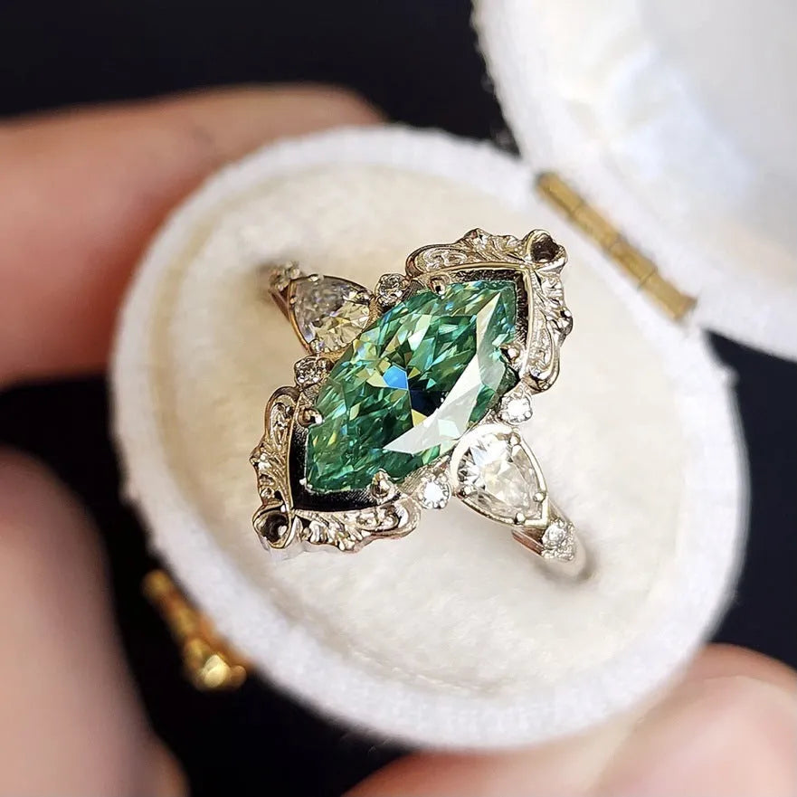 Alloy flower ring with green horse eye zircon centre electroplated silver finish available sizes No 6 to No 10