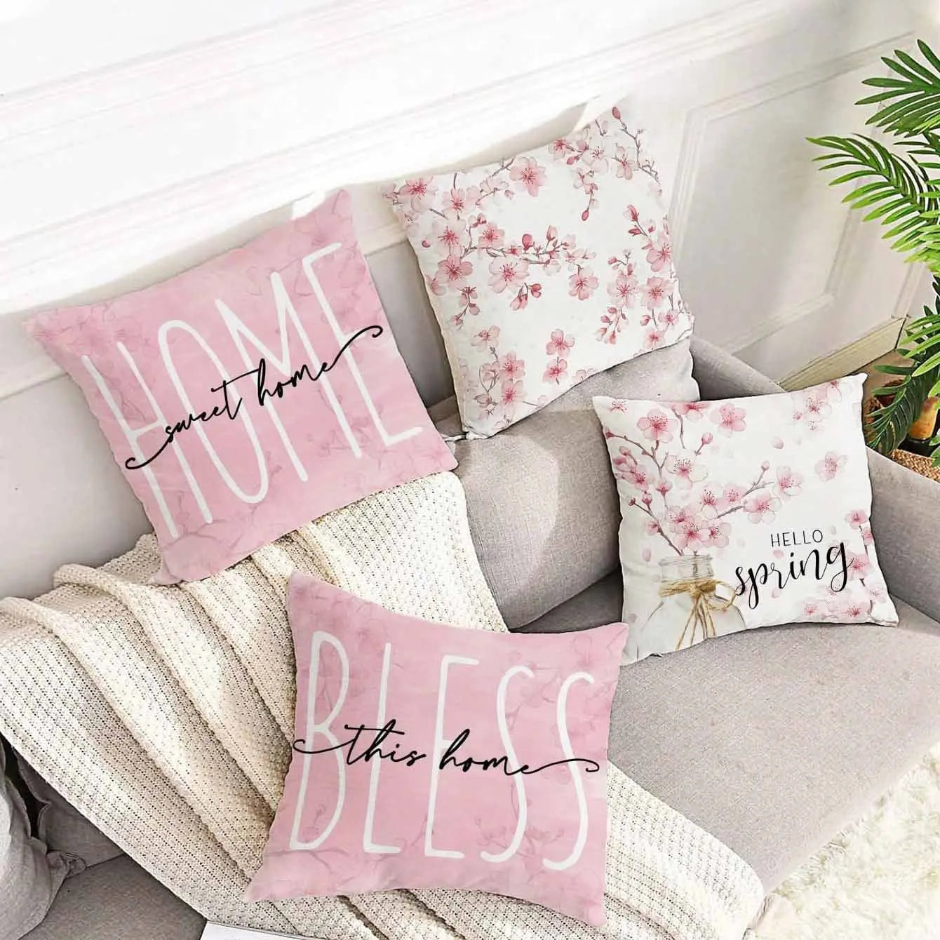 Square short velvet cushion cover with Spring Cherry Blossom Letter floral design, 45cm by 45cm.