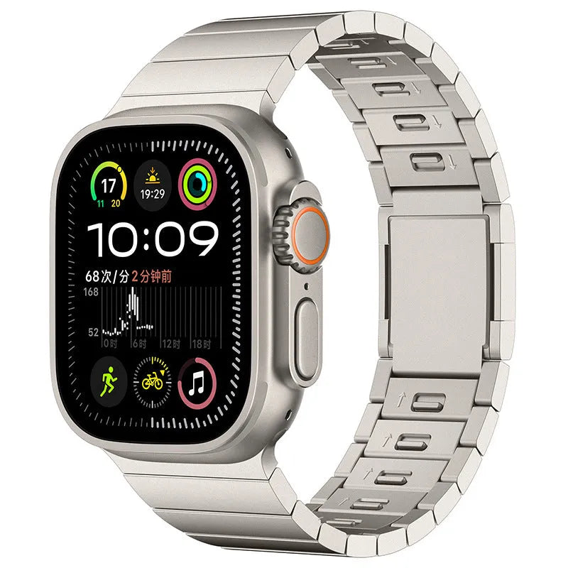Stainless steel magnetic buckle Apple Watch strap showing silver colour option on wrist