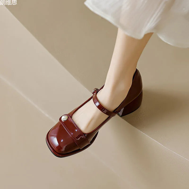 Women's patent leather ankle boots with chunky block heel and buckle fastening in three colour options