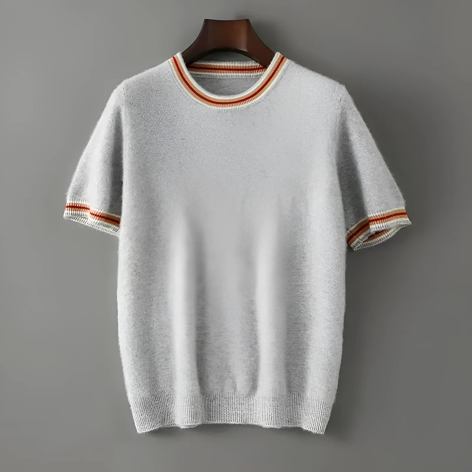 Men's grey pure wool short sleeve round neck pullover sweater laid flat.