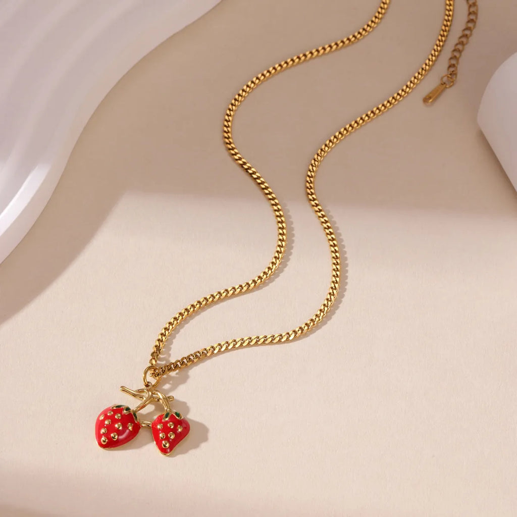 Stainless steel necklace with strawberry fruit pendant in red and white powder gradient colour options