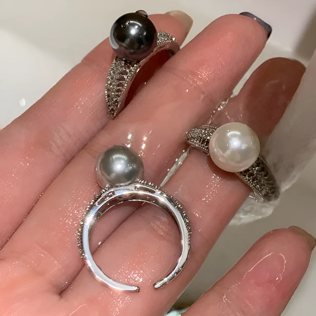 Geometric open ring with black pearl on adjustable copper band for women
