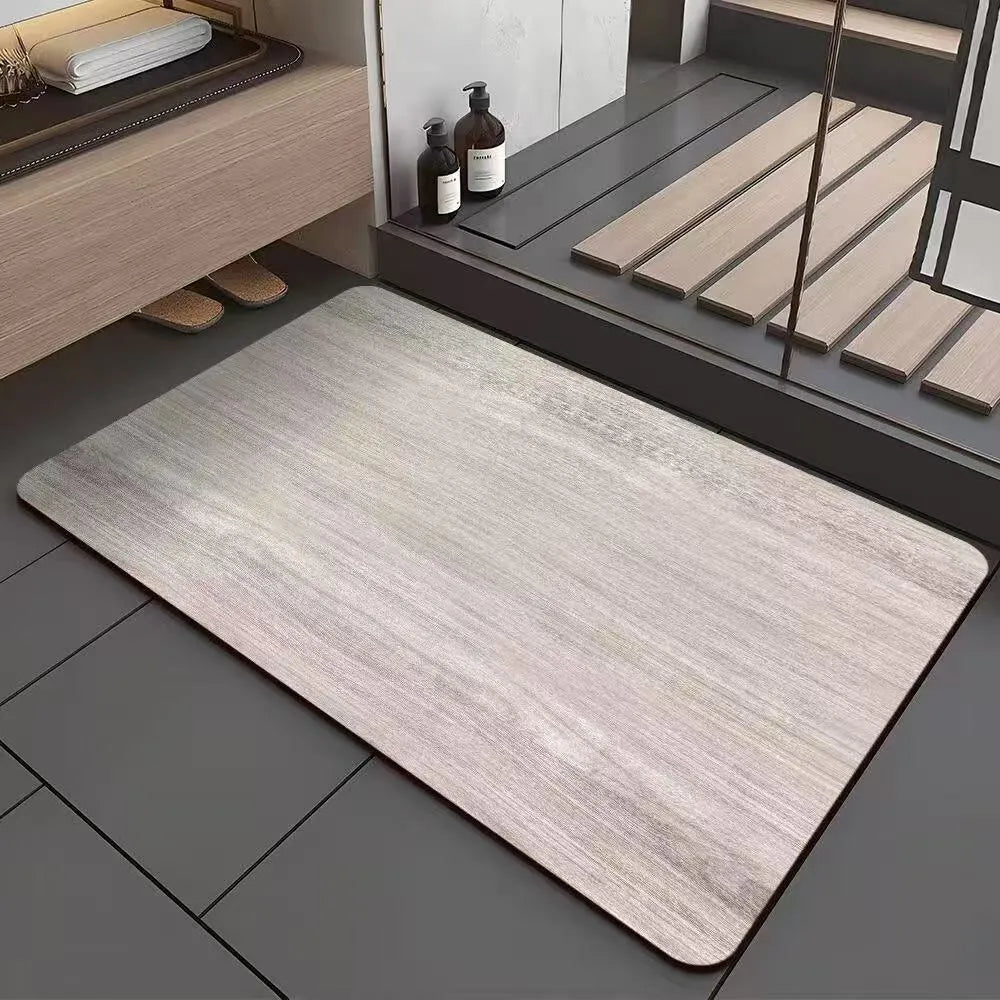 Square diatomite bath mat with a geometric wood grain pattern in a bathroom setting.
