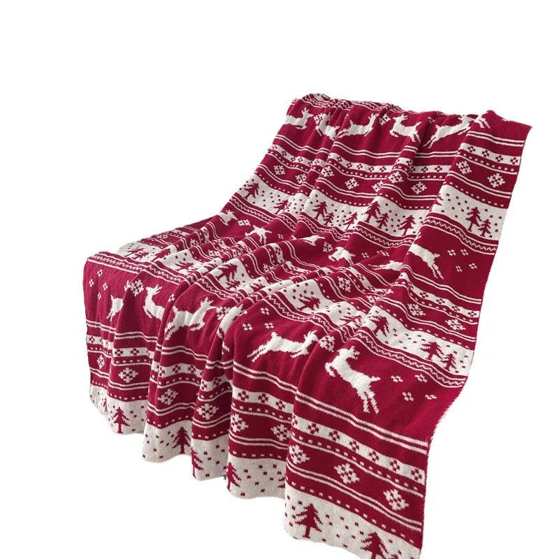 Christmas acrylic blanket showing snowflake or reindeer pattern in casual style