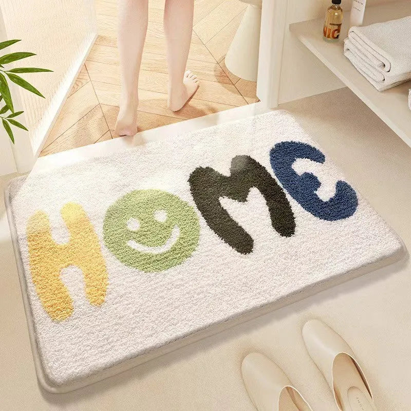 Square rainbow pattern floor mat with plastic bottom in Sky Sea colour, shown in 40x60cm size