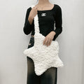 XINGX solid colour plush crossbody bag in pink with single shoulder strap and three-dimensional pocket