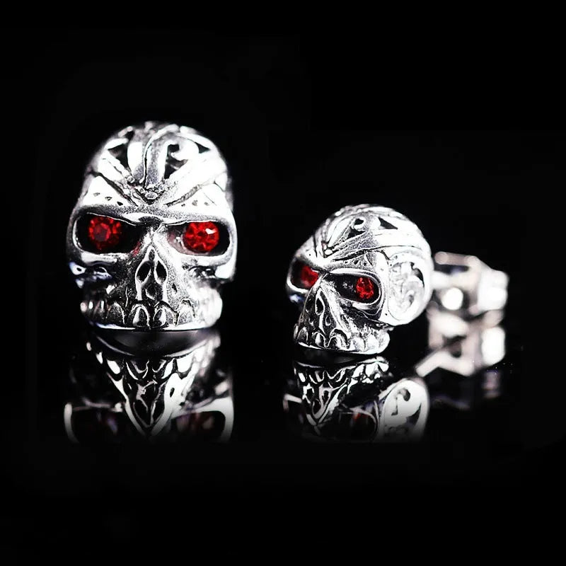 Red eye ghost head skull stud earrings with electroplated alloy construction and artificial gemstone details