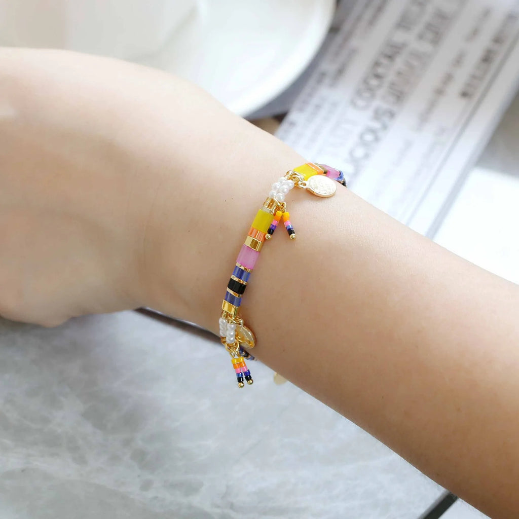 Women's handmade bracelet with imitation pearls and glass coloured beads in original design