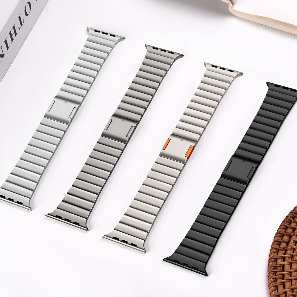 Stainless steel magnetic buckle Apple Watch strap showing silver colour option on wrist