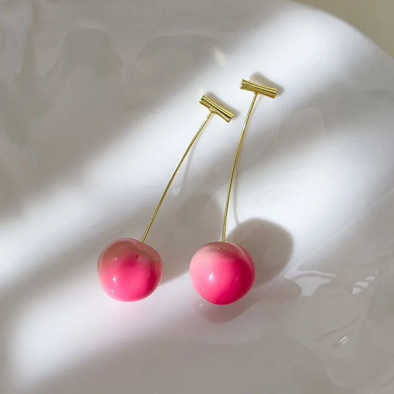 Acrylic peach fruit earrings in small and large sizes with copper posts