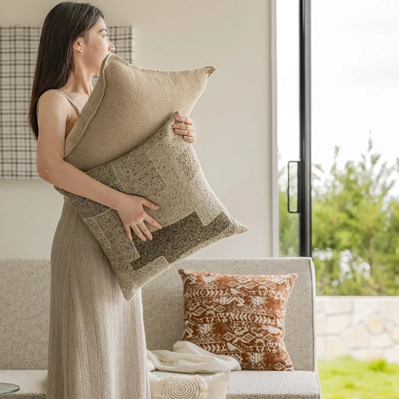 Solid colour decorative cushion pillow with PP cotton filler on a sofa