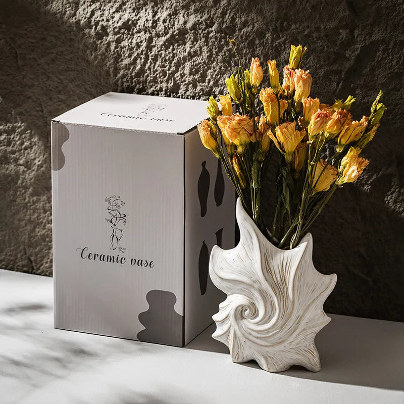 A European style retro ceramic vase with a coloured glaze finish, shown on a shelf.