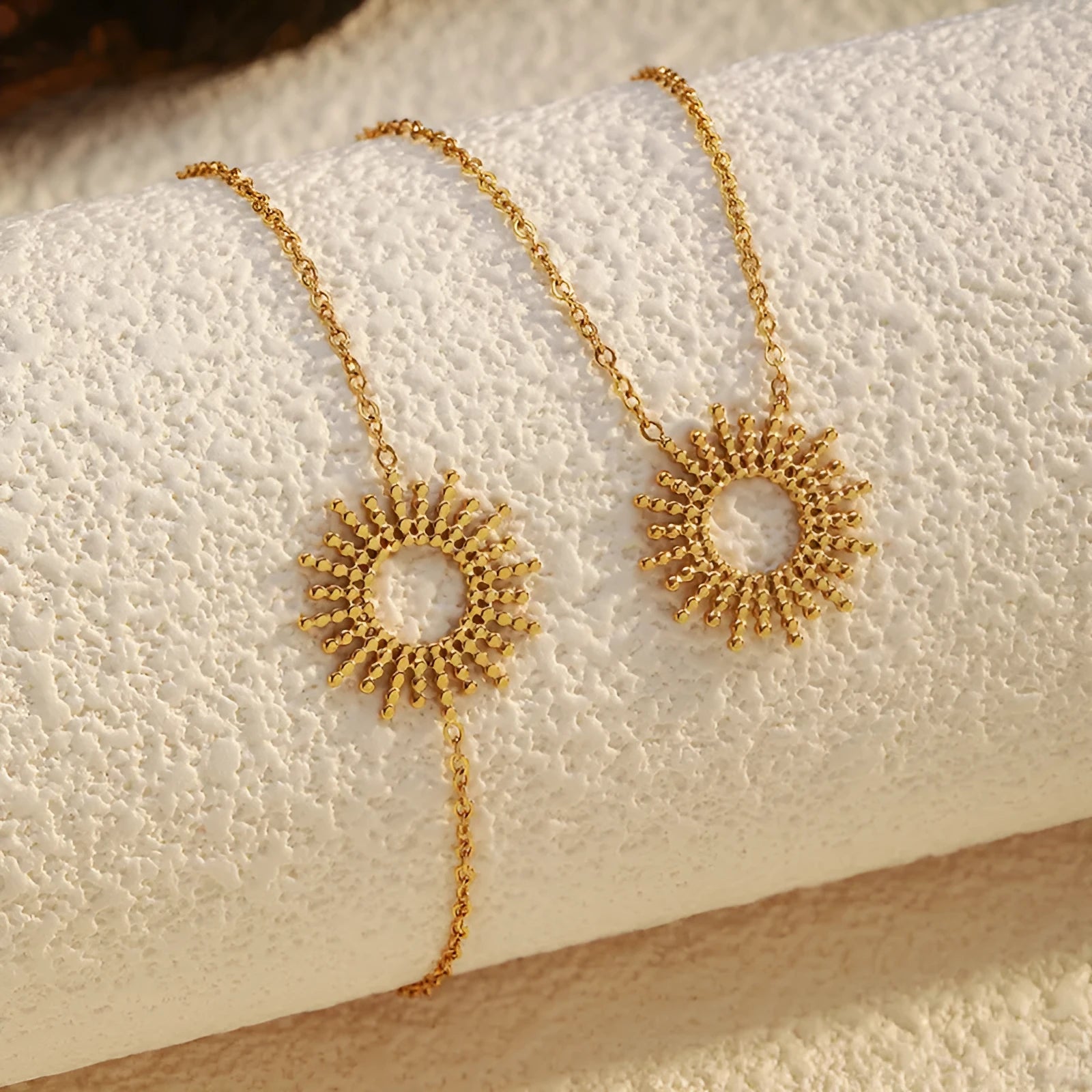 SUNFLOWER Series 14K gold necklace and bracelet set with geometric chain design on white background