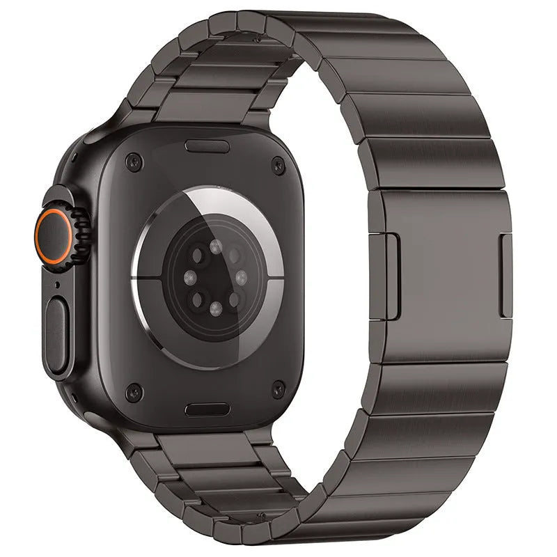 Stainless steel magnetic buckle Apple Watch strap showing silver colour option on wrist