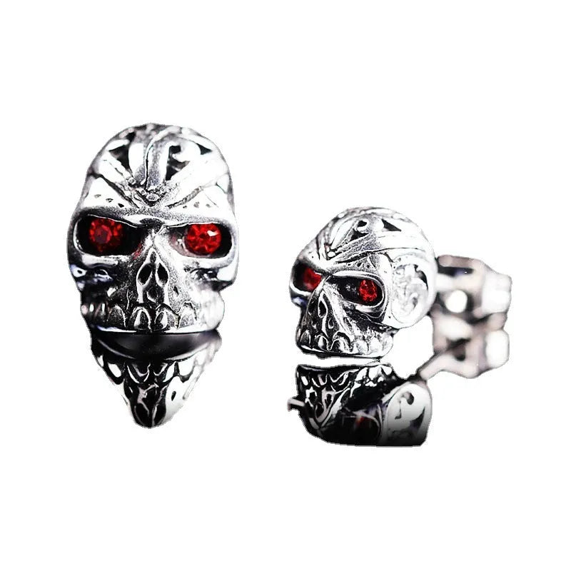 Red eye ghost head skull stud earrings with electroplated alloy construction and artificial gemstone details
