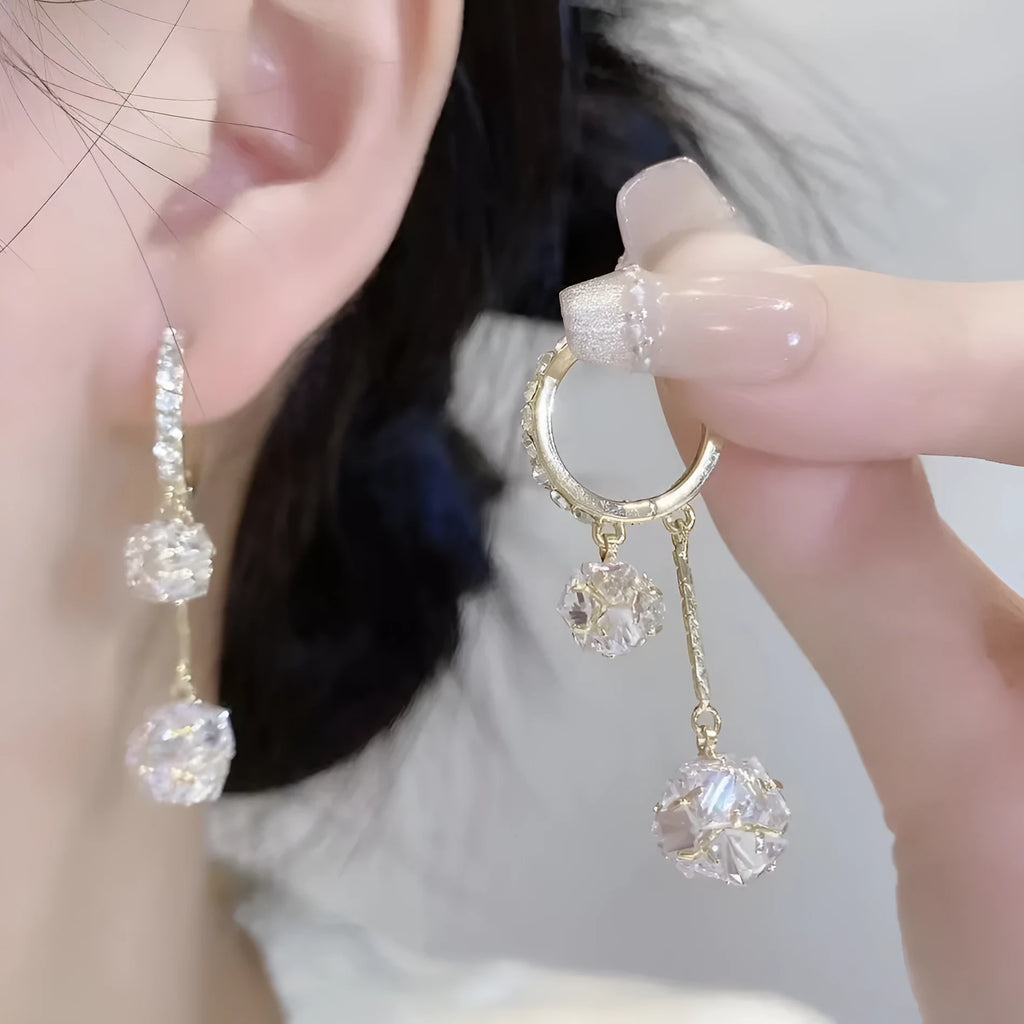 Silver balloon confession tassel earrings with rhinestone ball and drop shape design