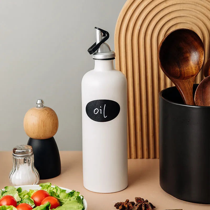 Ceramic oil pot with 650ml conical funnel and integrated oil brush in kitchen setting