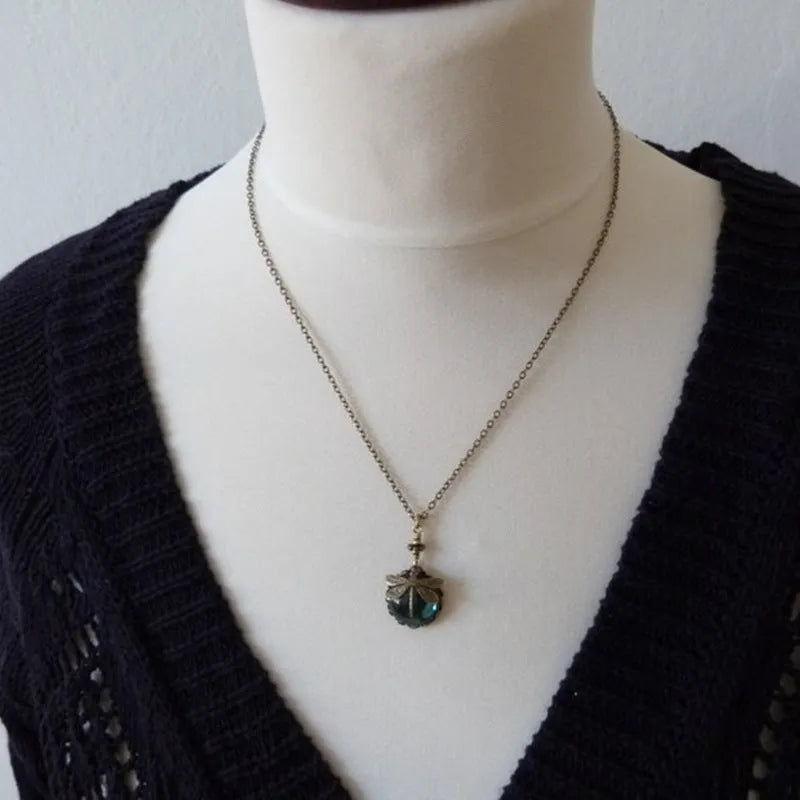 Hand-carved dragonfly pendant necklace in 925 silver with vintage bronze finish