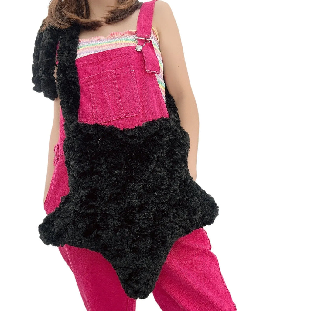 XINGX solid colour plush crossbody bag in pink with single shoulder strap and three-dimensional pocket