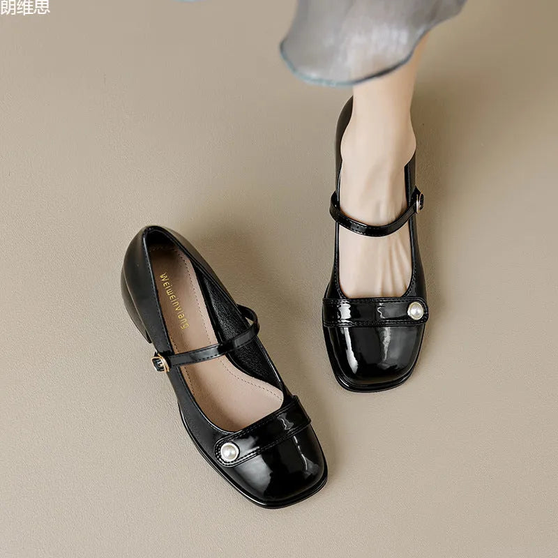 Women's patent leather ankle boots with chunky block heel and buckle fastening in three colour options
