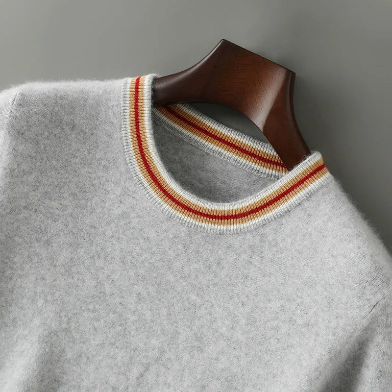 Men's grey pure wool short sleeve round neck pullover sweater laid flat.