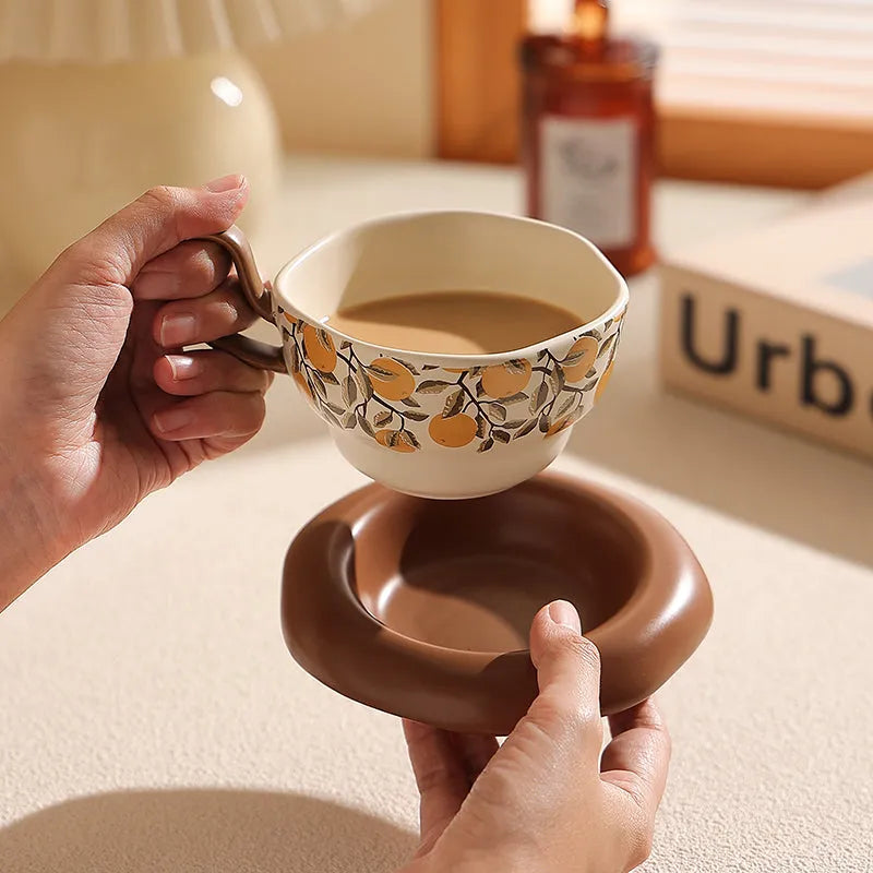 Ceramic coffee cup and saucer set in medieval pomegranate design with 210ml capacity